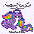 Digital design preview for a Southern Glam Lab handcrafted Louisiana angel cat trinket tray. The main design shows a purple and white cat with vibrant rainbow wings and a halo, alongside a smaller matching tray silhouette on a light purple and white checkered background.