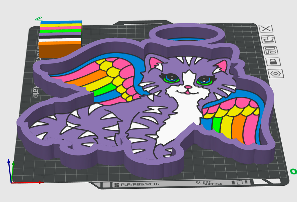 A 3D digital render of a purple cat-shaped cookie cutter or mold, featuring a white cat face, colorful rainbow wings, and sharp claw-like edges, shown on a gray gridded design software workspace background.