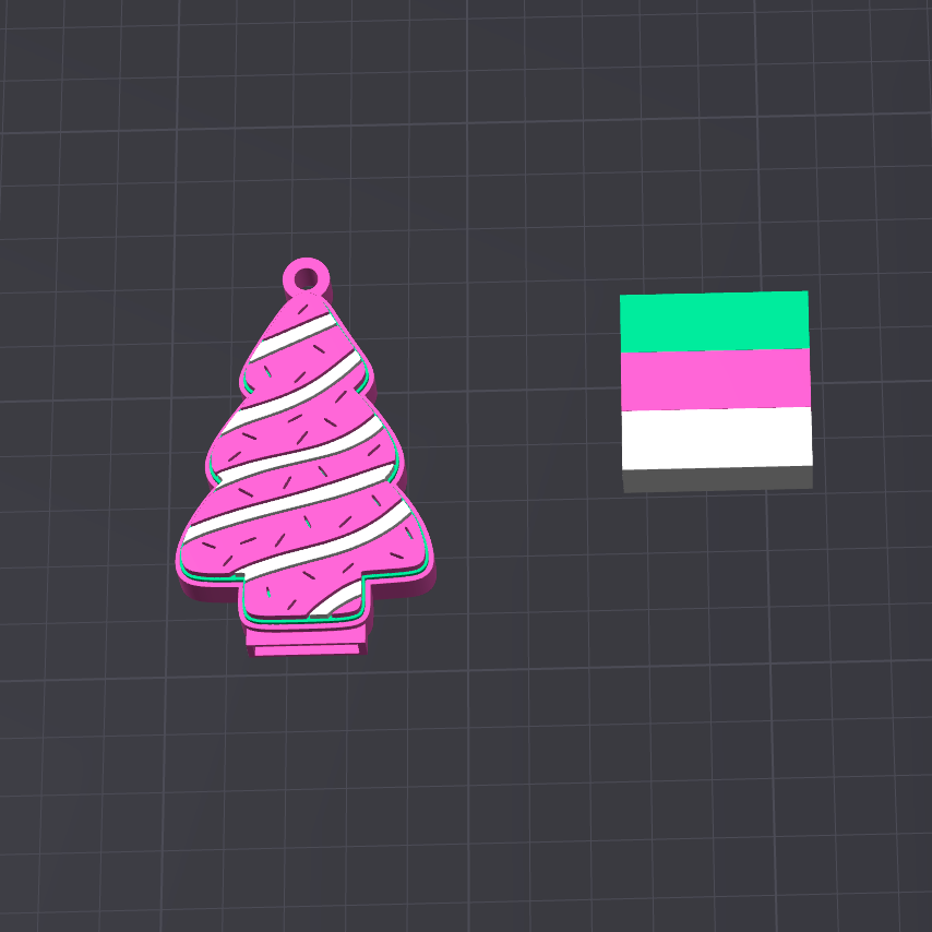 A pink Christmas tree-shaped ornament with white stripes and sprinkle details, shown next to a small square swatch with green, pink, and white horizontal stripes on a dark grid background.