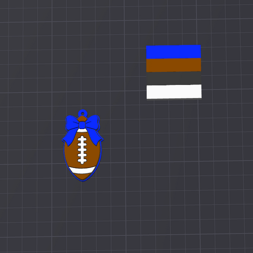 A small football-shaped charm or ornament with a blue bow, shown alongside a separate horizontal striped patch or swatch on a dark grid background.