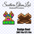Digital product preview for a Southern Glam Lab 'L & D' badge reel, showing a cartoon reindeer wearing a blue and green cap with 'L & D' on a green sign, next to a brown 3D rendering of the badge reel, on a white background with a faint checkered pattern.